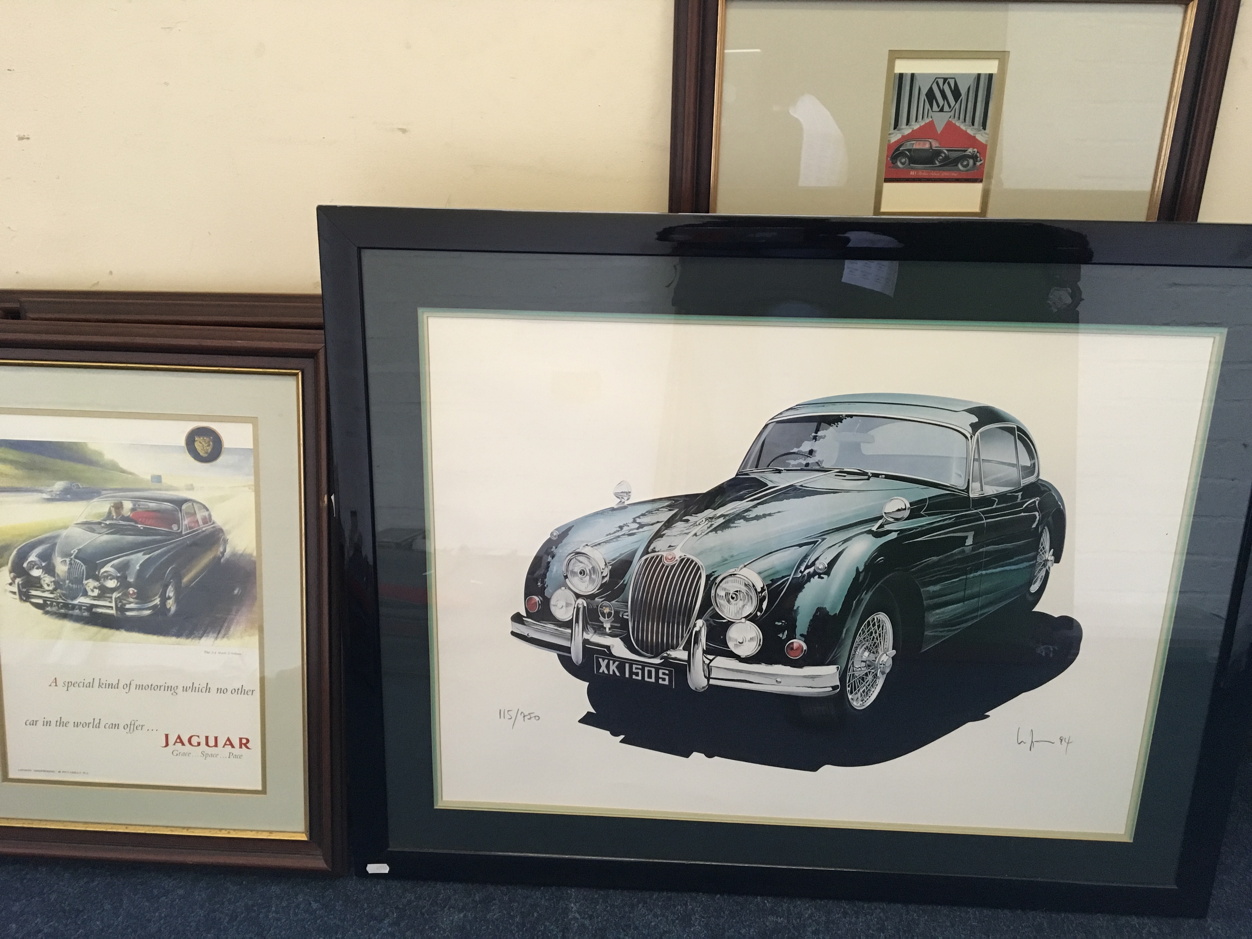 A selection of ten framed car related prints.