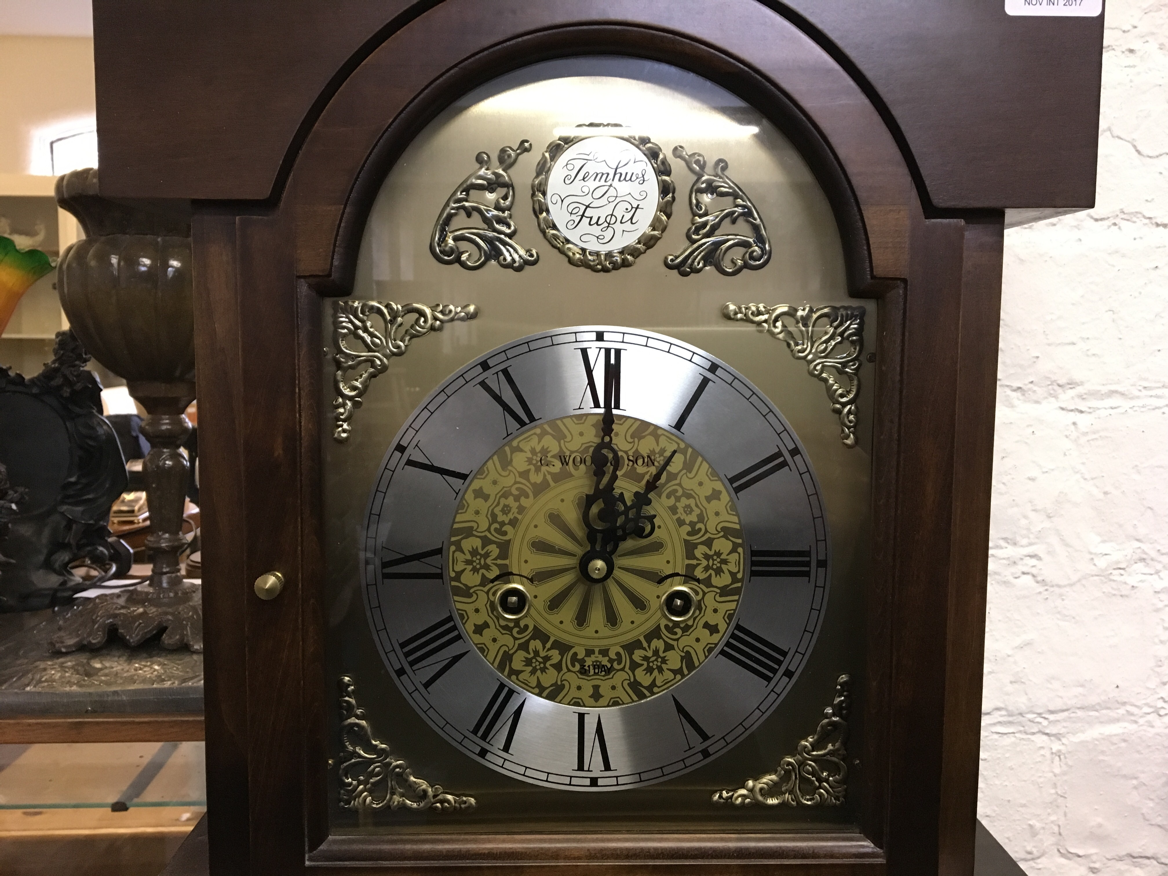 A reproduction mahogany cased hall clock by C.Wood&Son.