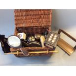 A wicker basket containing dressing table set, porcupine quill box, etc.
