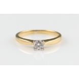 An 18ct yellow gold diamond solitaire ring, set with a round brilliant cut diamond, approx. 0.
