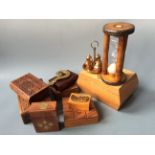 A sand timer, brass cruet set, boxes in form of books, boxes of cards, decorative box and wooden