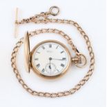 A 9ct yellow gold Waltham U.S.A full hunter crown wind pocket watch, the white enamel dial having
