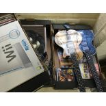 Five crates of video games and consoles including Wii sport resort, guitar hero, PlayStation