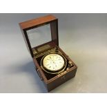 A T.S. & J.D. Negus, New York, No. 2469, two day marine chronometer, in mahogany box with brass