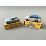 A Dinky 175 Hillman minx Saloon and 182 Porsche 356A coupe, in boxes. (NO CONDITION REPORT,