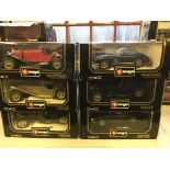 Six Burago boxed model vehicles including Mercedes Benz 300 SL (1964), Jaguar SS 100 (1937), 'E'