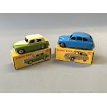 A Dinky 153 Standard Vanguard Saloon and 154 Hillman Minx Saloon, in boxes. (NO CONDITION REPORT,