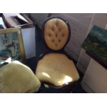 Two Victorian walnut spoon back nursing chairs.