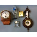 A mahogany cased barometer, hanging wall clock, Woodford mantel clock, timemaster and Waterford