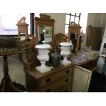 A pine dresser with central and wing mirrors and three drawers.