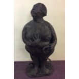 SUE MACHPHERSON. Titled 'Eve', mixed media sculpture, Eve holding snake with apple. Height 139cm.