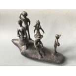 SUE MACPHERSON. Titled 'Washed Up', mixed media sculpture, children on rock. Height 31cm.