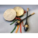 Two exercise batons with two tambourines.