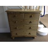 A Victorian pine two short and two long drawer chest.