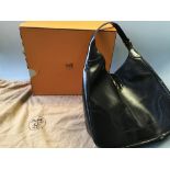 A Hermes black box trim 31 leather shoulder bag, with sack and box.