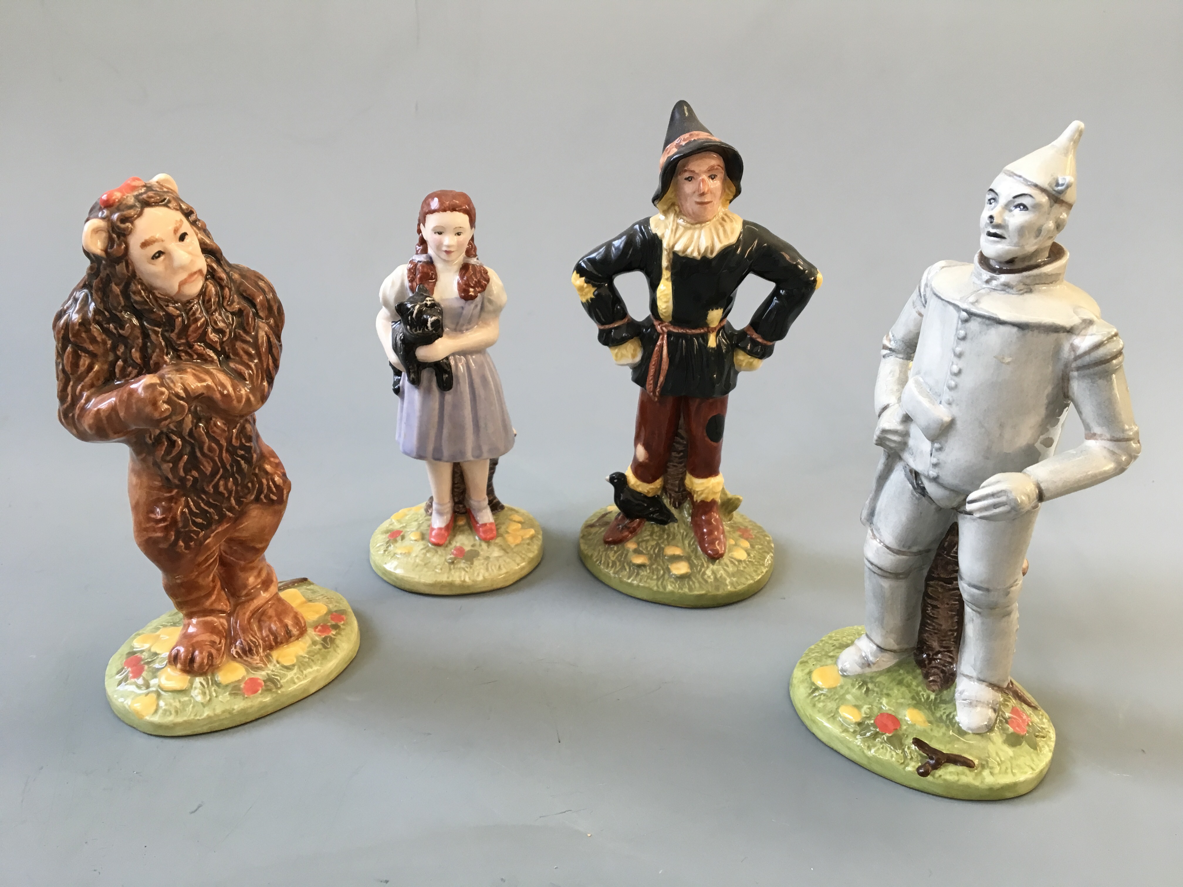 Royal Doulton The Wizard of Oz Collection figurines, Dorothy, Scarecrow, Lion and TinMan.