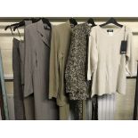 A selection of Jean Muir trouser suits with woolen and cotton items in various sizes, some unworn