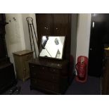 A Stag two piece bedroom suite including two door wardrobe and dressing table with mirror.