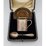 A boxed engraved silver Christening set, comprising of a plate, cup and spoon, cup and plate
