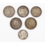 A lot to include three Victoria crowns, dated 1889-1892, a George V 1937 crown, a Victoria 1889