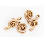 A pair of Victorian 9ct rose gold novelty cufflinks in the form of clefs, hallmarked Chester 1898.