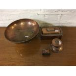 Copper hand beaten arts and craft ware to include bowl, lidded cigarette box, inkwell and napkin