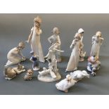 A selection of figurines to include seven Nao and three Lladro depicting girl with kittens, clown,