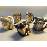 Five Royal Doulton character jugs including Robin Hood, Robinson Crusoe, Don Quixote, Scaramouche