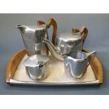 A Picquat ware stainless steel teapot, coffee pot, cream jug and sugar bowl.