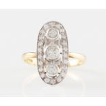 *An 18ct yellow gold modern Belle Epoque style diamond ring, set with three graduated principal