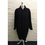 A Trussardi navy coat, size 48.