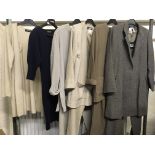 A selection of Jean Muir trouser suits with Cotten and woolen items in various sizes, some unworn