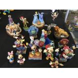 Twenty Disney Showcase Collection figurines including Let the Season Ring, The One that started them