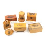 Mauchline ware _ seven pieces - comprising a dome top box (The Donkey Well, Carisbrooke), 9.7cm, a