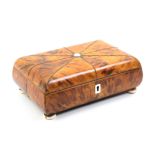 A Regency blond tortoiseshell sewing box of rectangular form, the domed lid divided by pewter