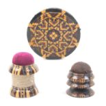 Tunbridge ware _ three pieces comprising stickware waxer with pincushion top, 3.6cm, a pin wheel