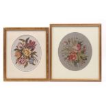Two 19th Century oval floral needlework embroidered panels, both later mounted glazed and framed,