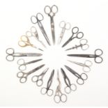 Seventeen pairs of steel scissors, including two pairs each as a stork, largest 14cm (17)