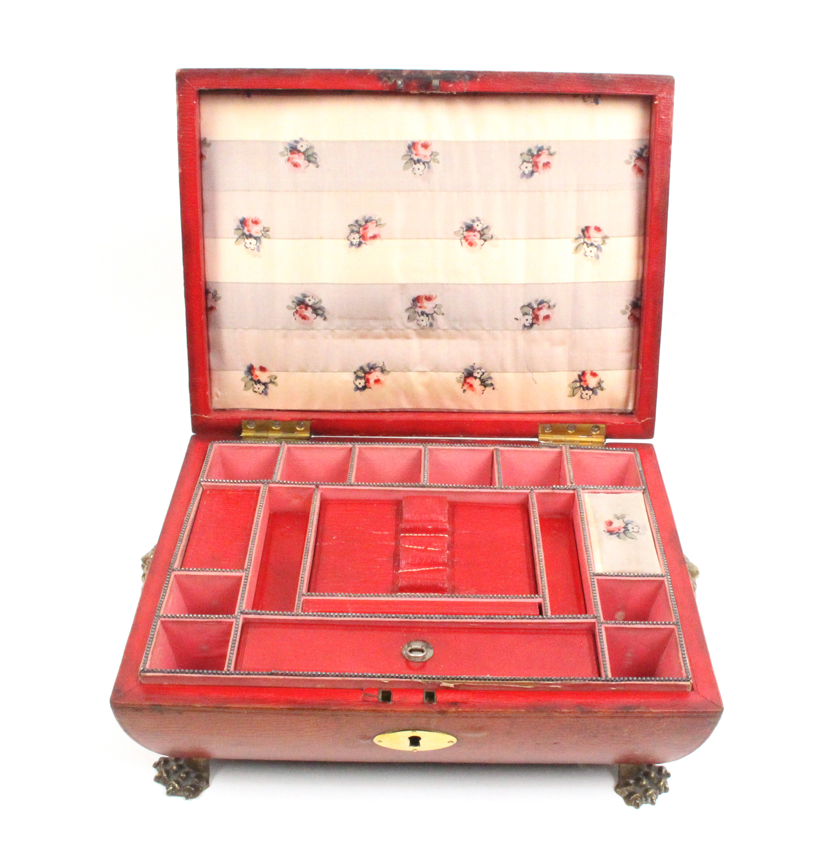 A Regency red leather covered sewing box of sarcophagal form, the stepped top with gilt brass corner - Image 2 of 2