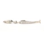 An early 19th Century German silver sewing companion in the form of an articulated fish, the