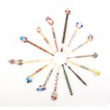 Fourteen lace bobbins comprising seven in bone bound with coloured beads, a chip carved wooden