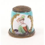 An 18th Century English enamel thimble, Staffordshire, the duck egg blue ground with a half length