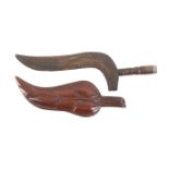 Two 19th Century wooden knitting sticks comprising a mahogany example shaped and carved in the