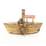 A rare gilt brass novelty tape measure in the form of a paddle steamer, striped deck canopy,