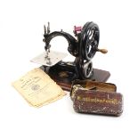 Willcox and Gibbs ïAutomaticÍ Silent Sewing Machine, on plinth in wooden box with metal straps and