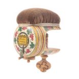 A painted Tunbridge ware sewing clamp/ tape measure, the line and floral painted cylinder frame