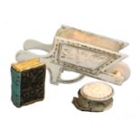 A pincushion and two emeries the ivory pincushion in the form of a wheelbarrow with gilt floral
