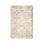 A Victorian silver visiting card case with hinged cover decorated all over with panels of flowers