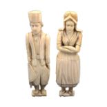 A fine pair of Late 18th Century Dieppe carved ivory standing figural needlecases in the form of