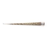 An unusual early 19th Century Dutch silver mounted knitting stick, of tapering cylinder form bound